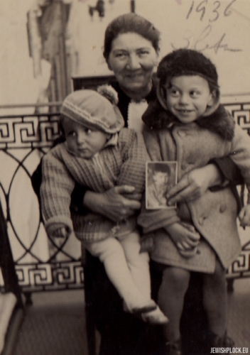 Kuba Guterman on the balcony of the Kowalski family with Zysa Kajla Kowalska and her grandson, 1936